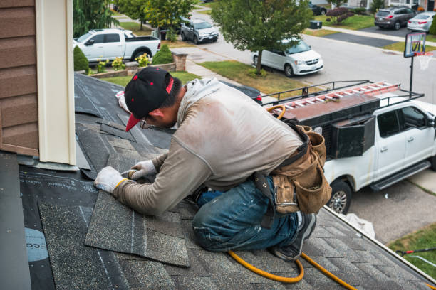 Professional Roofing technician working in Harpster, OH